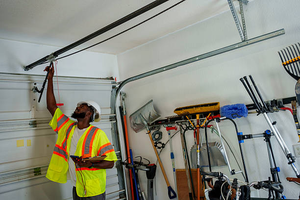 Professional Garage Door Panel Replacement technician working in Plentywood, MT